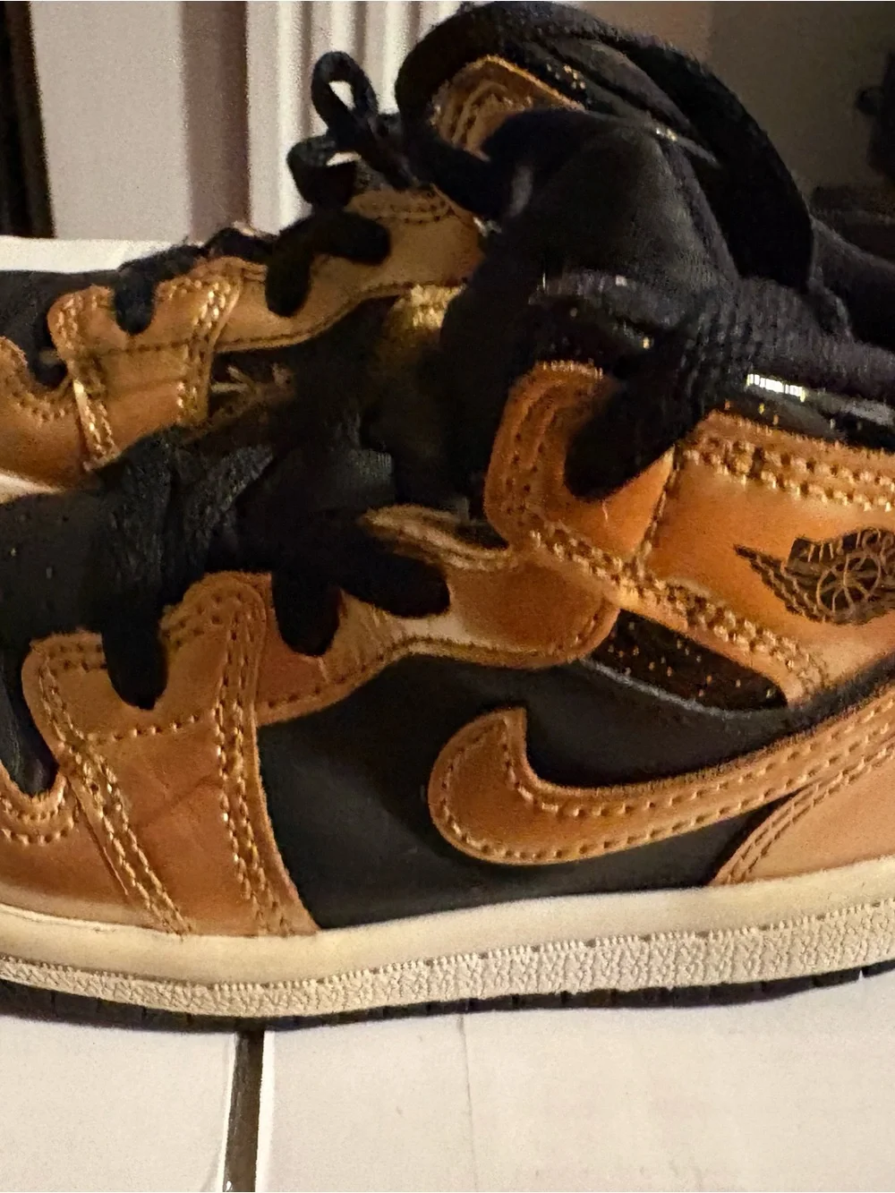 Nike Kids Black and Gold High-Top Sneakers